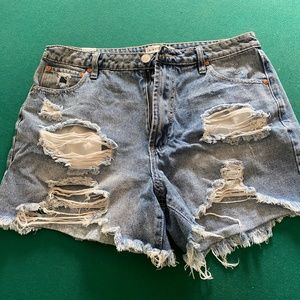 Distressed denim shorts